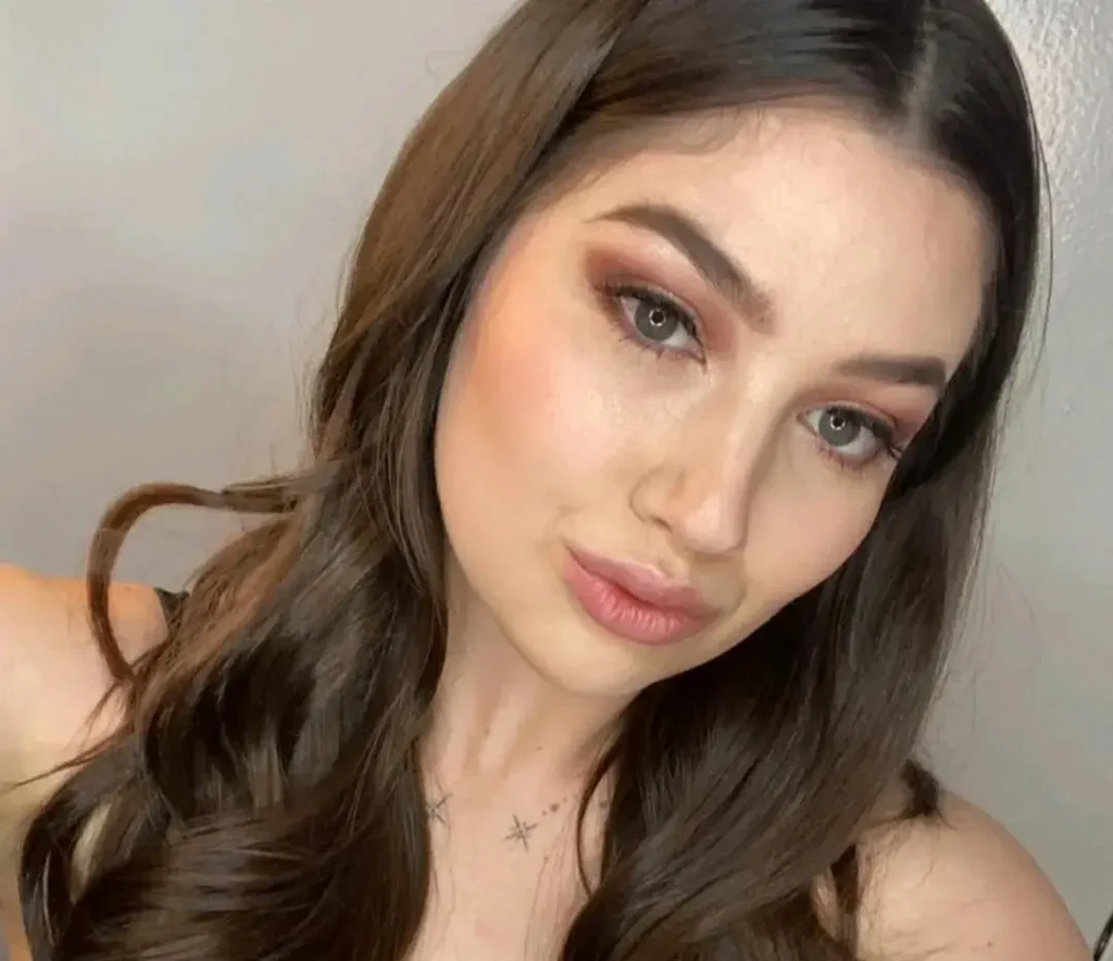 Alyx Star portrait showing brown hair and hazel eyes