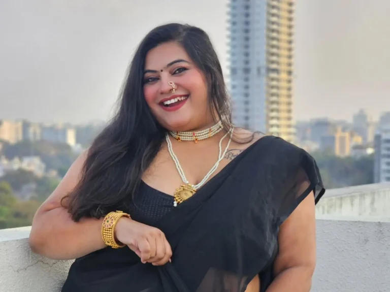 Jaanvi Omkar Indian plus size model posing in a saree