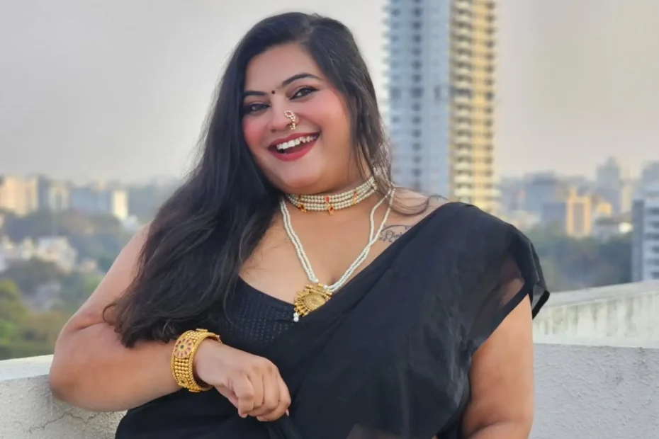 Jaanvi Omkar Indian plus size model posing in a saree
